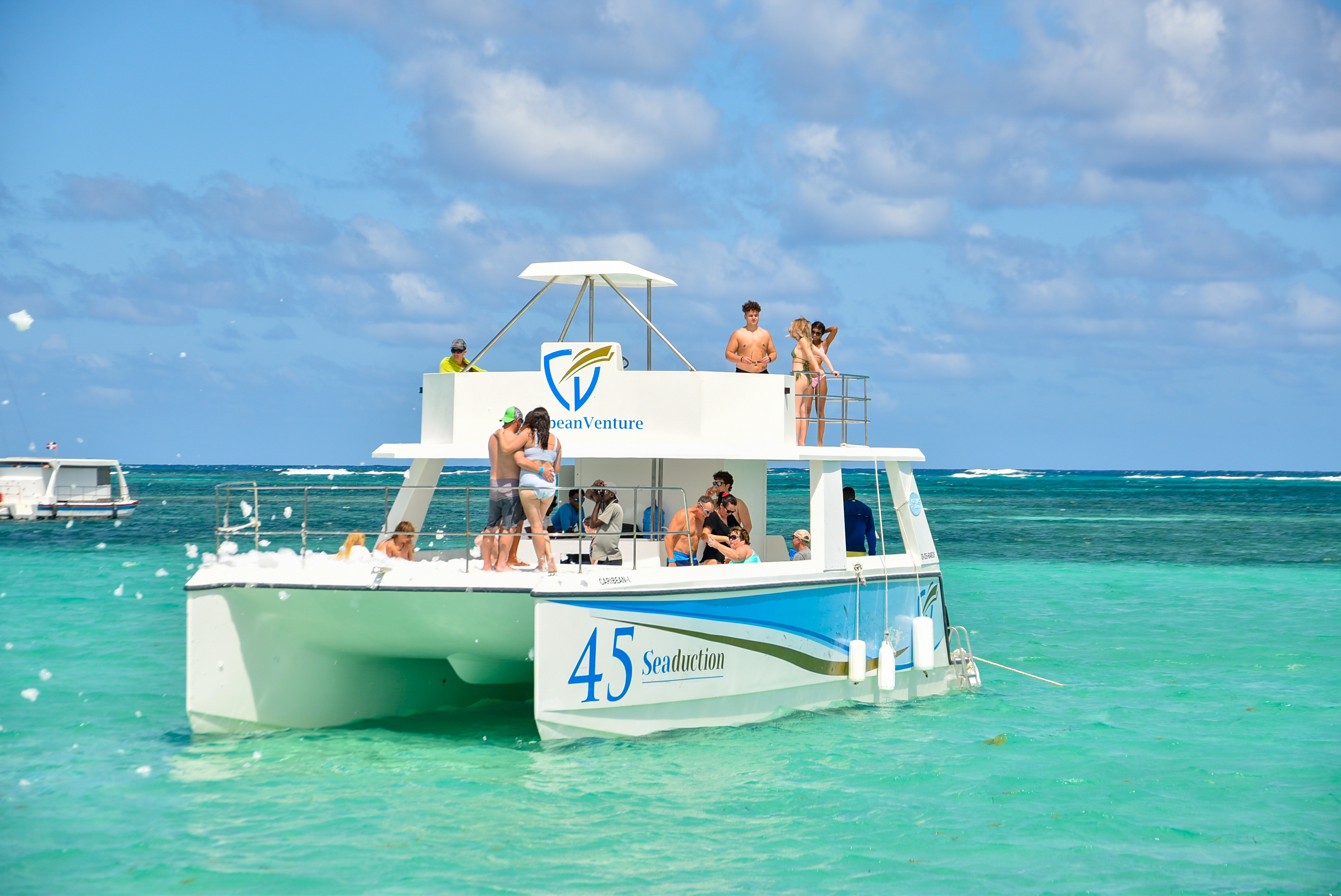 Infinity Party Boat in the turquoise Caribbean waters
